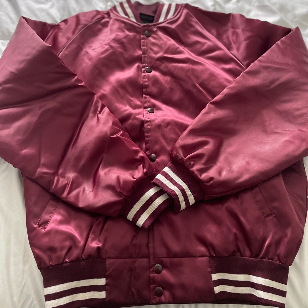 Maroon varsity jacket